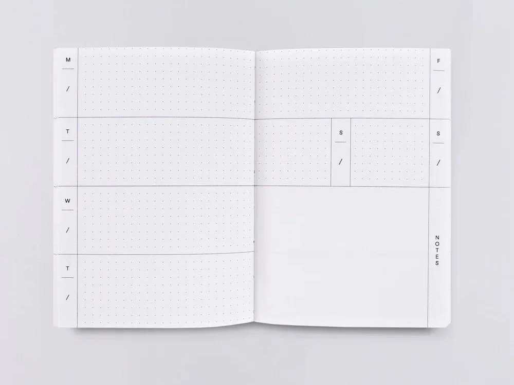 The Completist Undated Weekly Planner Inside